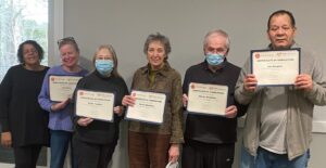 Smiling Barnstable computer skills certificate ceremony